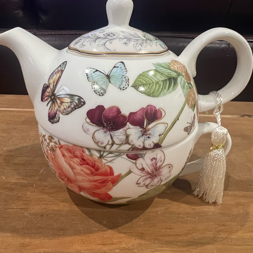Teapot for one set. Beautiful peony flowers and butterflies. Teapot holds 14 oz.
